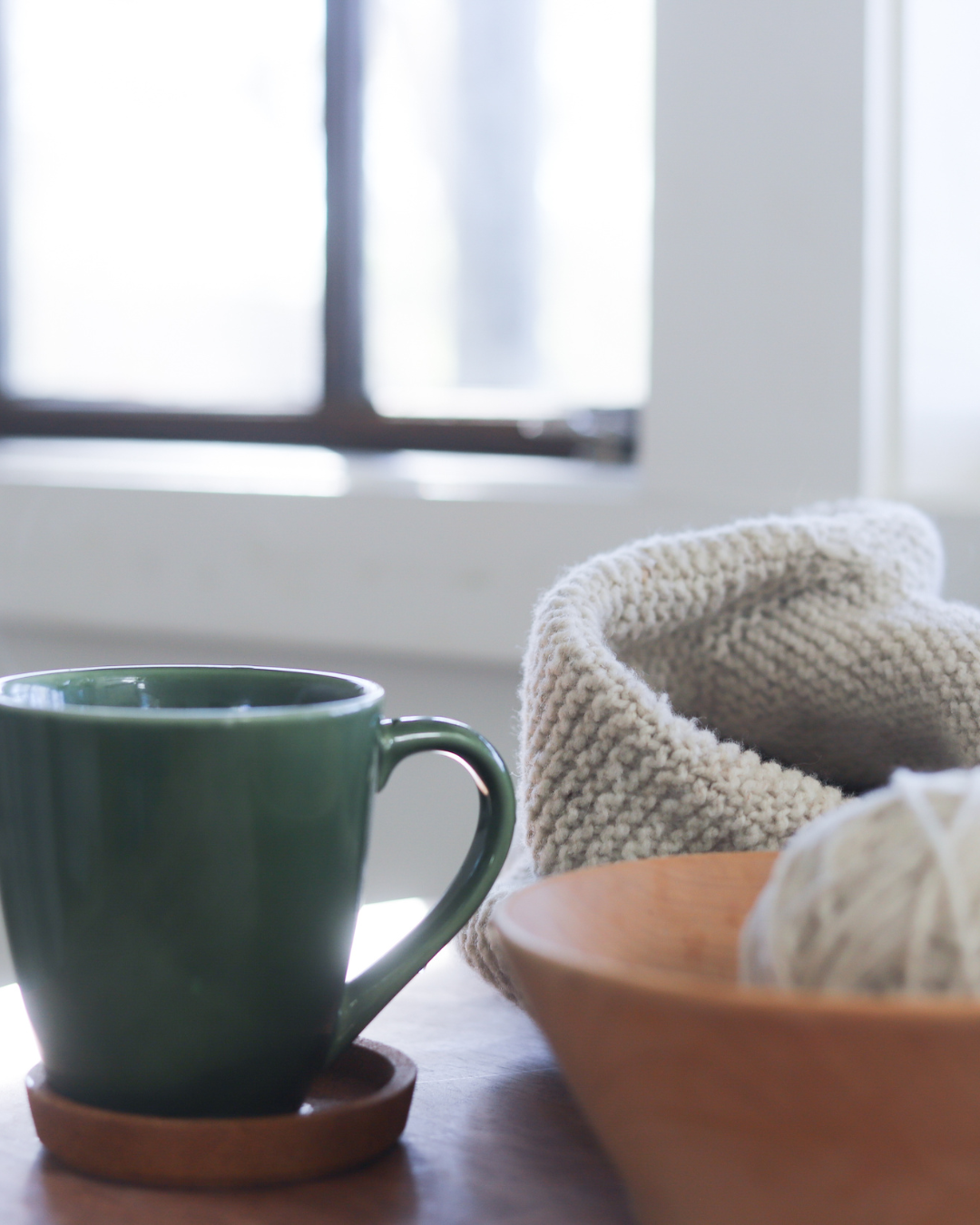 Cozy knit sweater and coffee mug.
