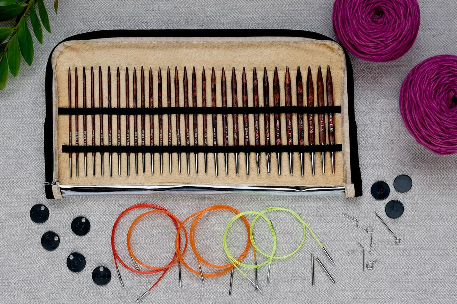 Interchangeable knitting needle set in case.