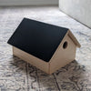 handmade yarn bowl shaped like a bird house with a magnetic roof to keep notions handy
