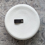 white cotton basket for knitting and yarn storage